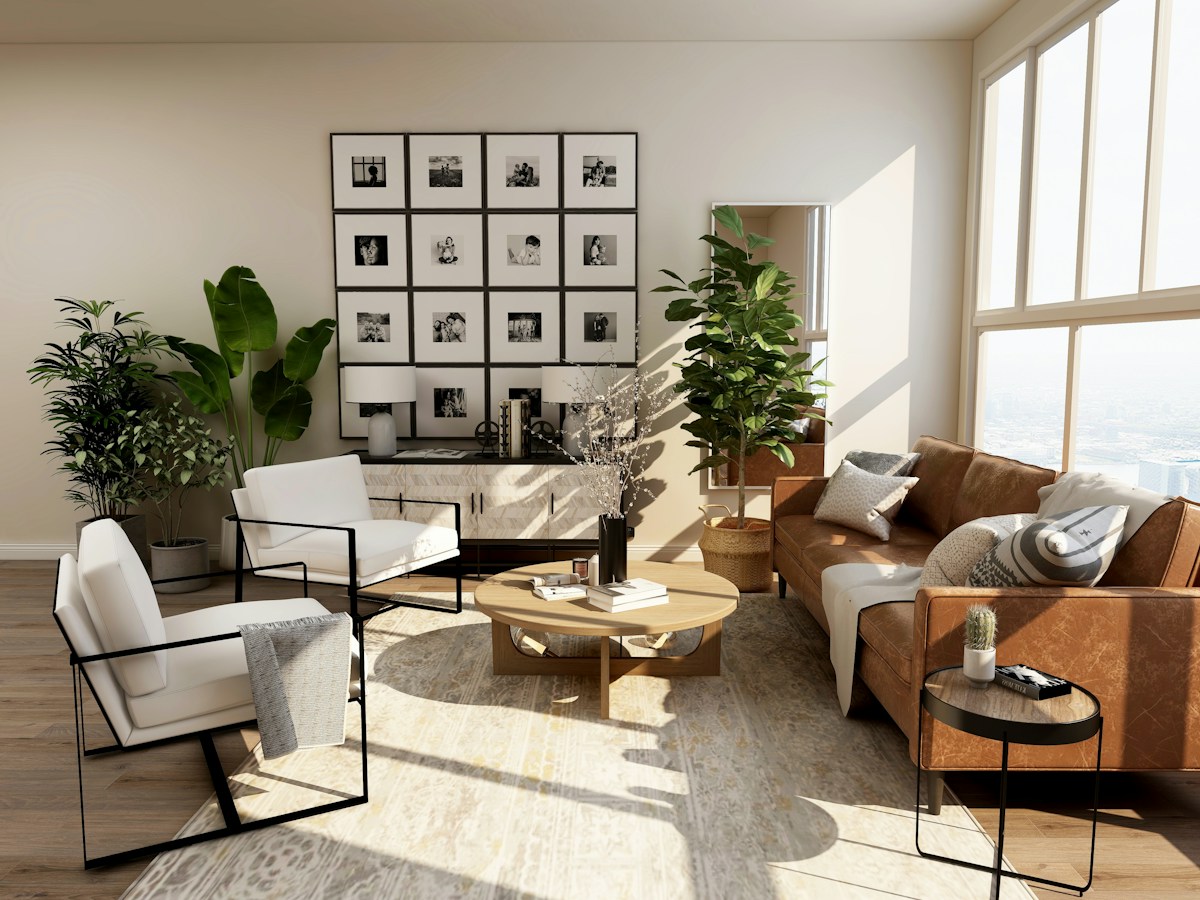 Bright living room with sofas, armchairs and large windows — illustrative photograph